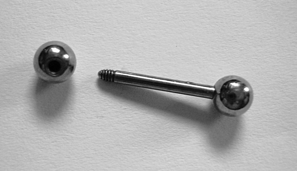 What is barbell piercing?